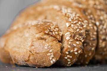 Wall Mural - Close-up image of a bread cutting on a white background isolated dark background