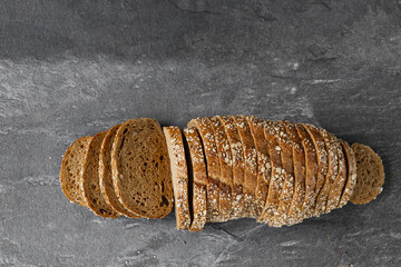 Wall Mural - Close-up image of a bread cutting on a white background isolated dark background