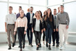 © ASDF - young business people walking together in a new office