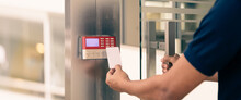 Proximity Card Reader Door Unlock, Close Up Hand Security Man Using ID Card Scanning At The Access Control System For Identity Verification To Open The Door Or For Security Safety Or Check Attendance.