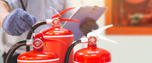 Fire Extinguisher Has Hand Engineer Inspection Checking Pressure Gauges To Prepare Fire Equipment For Protection And Prevent Emergency And Safety Rescue And Alarm System Training Concept.