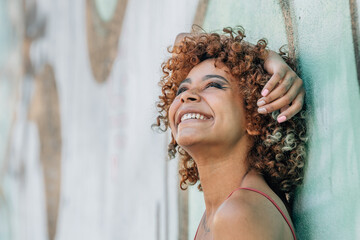 girl smiling happy on the street outdoors in summer