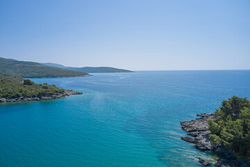 seascape with clear sky and rocky coastline