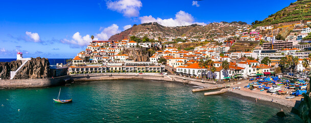Wall Mural - Charming traditional fishing village Camara de Lobos. Popular tourist destination .Madeira island travel and landmarks. Portugal