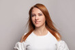 © millaf (Nemchinova) - Beautiful happy redhead woman with long smooth hairstyle, beauty concept