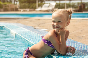 Pool for Kids at Sea Resort. Happy Child Little Girl in Children Pool.