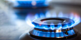 Fototapeta Dmuchawce - kitchen gas cooker with burning fire propane gas