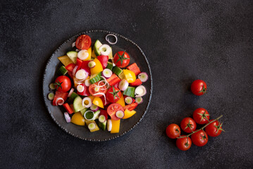 Wall Mural - Fresh vegetables salad with tomatoes, peppers, cucumbers and other ingredients, healthy eating