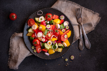 Wall Mural - Fresh vegetables salad with tomatoes, peppers, cucumbers and other ingredients, healthy eating