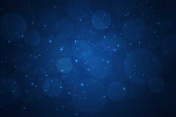 blurred bokeh light on dark blue background