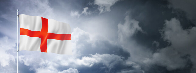 Wall Mural - English flag on a cloudy sky