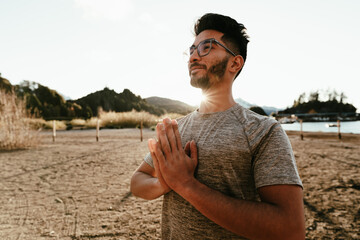 Young man practicing yoga