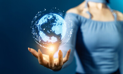 Aufkleber - Young woman watching holographic globe. Global communication network concept.