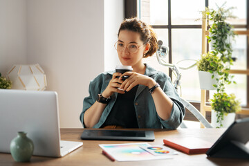 Woman is working at workshop