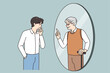 © drawlab19 - Young man look in mirror see talk with future old self. Younger generation male get advice from older generation himself. Lifetime and self-realization. Vector illustration.
