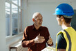 © Westend61 - Architect discussing with construction worker at office