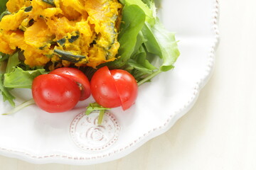 Wall Mural - Homemade pumpkin and mayonnaise  with cherry tomato and baby leaves