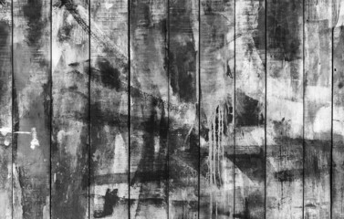 Wall Mural - Grungy old wooden wall with black paint strokes