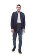 © ASDF - young man in jeans striding forward . isolated on a white