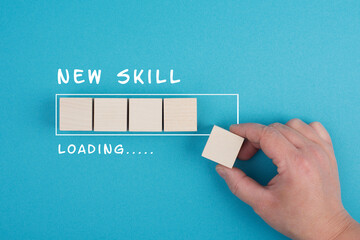 progress bar with the words new skill loading, education concept, having a goal, online learning, kn