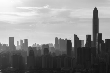  Silhouette of skyline of Shenzhen city, China under sunset. Viewed from Hong Kong border