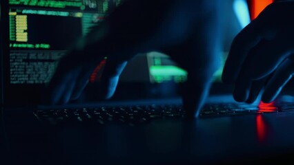 Close up of developing programming and coding technologies. Programmer hands are typing on keyboard. Software coder or blockchain developer at night. Concept of bitcoin cryptocurrency and wallet hack