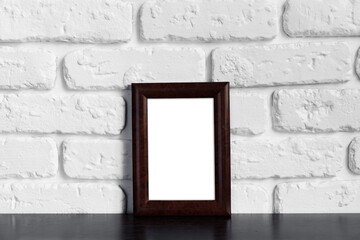 Wall Mural - Photo frame with copy space against white brick wall