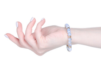 Wall Mural - jewelry bracelet stones on female hand on white background isolation