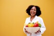 Portrait African American Positive dietitian with fruits and vegetables for healthy eating and diet. Healthy food, dietitian consultation.Brazilian Nutritionist consultant health care Isolated.