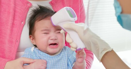 Sticker - asian doctor examine baby fever