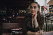 © Ahmed - Beauty young brunette woman sitting at the bar