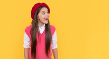 Amazed Teen School Girl In French Beret On Yellow Background, Amazement