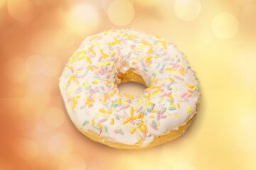 Wall Mural - Sweet tasty white glazed donut on the desk