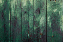 Old Distressed Wooden Planks Wall With Worn Out Green Peeling Paint