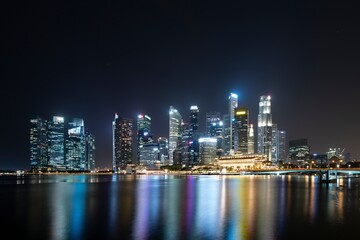 Wall Mural - Singapore May 22nd 2022 - Cityscape of the Singapore financial business district at night