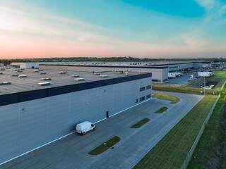 Poster - Pictures from the drone on the warehouse building. Concept for storing goods, shipping for stores, ecommerce, online stores. Aerial view on warehouses.