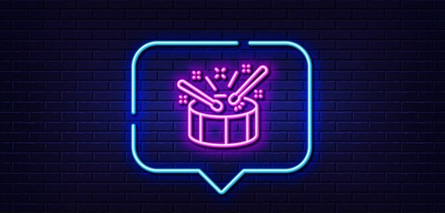 Sticker - Neon light speech bubble. Drums with drumsticks line icon. Music sign. Musical instrument symbol. Neon light background. Drums glow line. Brick wall banner. Vector