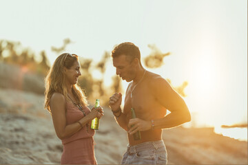 Canvas Print - Couple Enjoying Sunset At The Beach