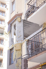 consequences of russian war crimes. destroyed houses in irpin city, ukraine. mortar shell hit someone home during war