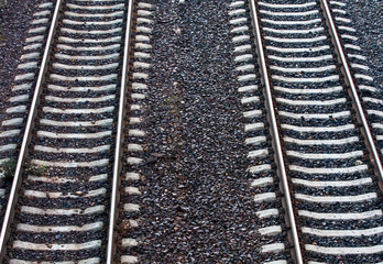 Parallel railroad tracks viewed from above. two ways.