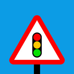 Warning triangle traffic signals ahead on this road sign