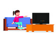 © Prihantoedi - a little girl enjoys watching television while sitting on the sofa