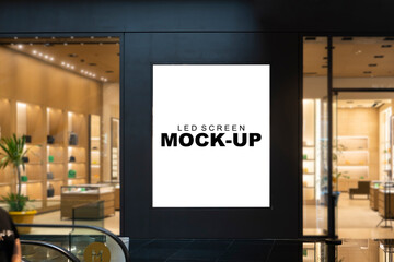 Wall Mural - Mockup advertising LED Screen in front of women handbag shop