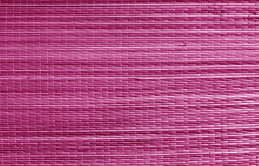 Wall Mural - Natural bamboo wallpaper texture in pink color.