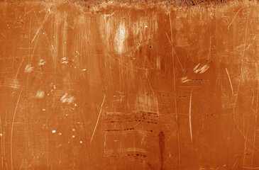 Wall Mural - Grungy rusted metal wall surface in orange tone.