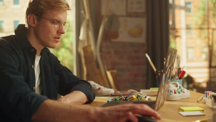 Poster - Concentrated Male Blogger Working From Home, Uses Laptop Computer. Influencer Internet Personality Looking for Ideas For His Blog while Browsing Cyberspace. Freelance and Millennial People Concept