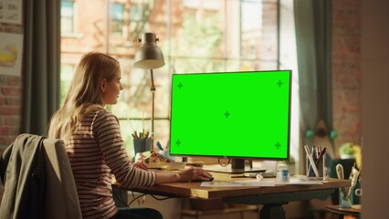 Poster - Focused Female Designer Using Keyboard while Modelling on Desktop Computer with Green Chroma Key Monitor. Modern Freelancer at Remote Work Concept. Medium Shot