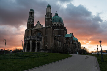 Koekelberg, Brussels Capital Region - Belgium -  The basilica of the sacred heart with colorful clouds and no people during the Brussels lockdown