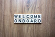 Welcome onboard text from wooden blocks