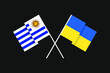 Flags of the countries of Ukraine and Eastern Republic of Uruguay (South America) in national colors. Help and support from friendly countries. Flat minimal design.